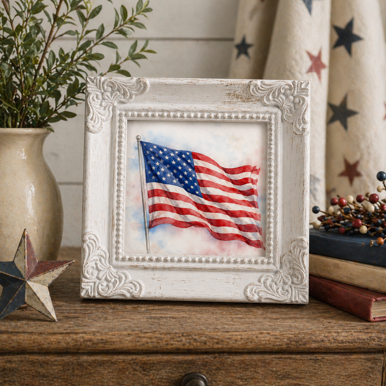 Framed watercolor painting of an American flag on a wooden surface with decorative items.