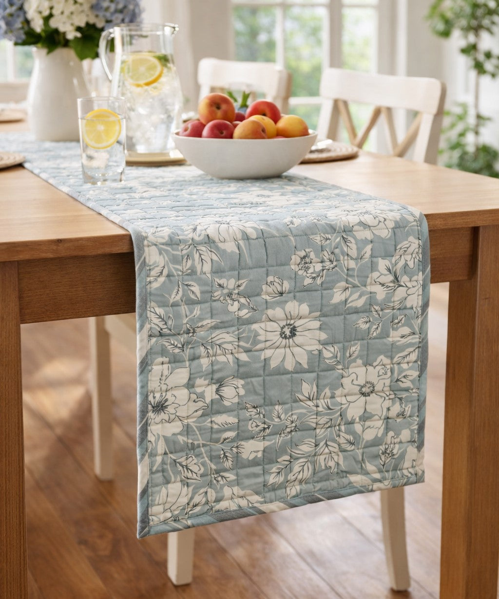 Quilted Blue Floral Table Runner 56 inch - Reversible cotton table runner with soft blue floral pattern and blue-cream striped reverse for dining decor