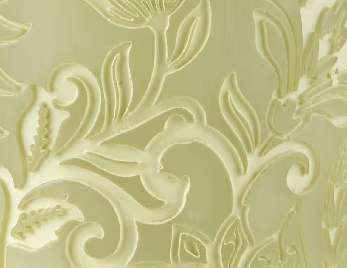 Decorative embossed pattern on a light beige background