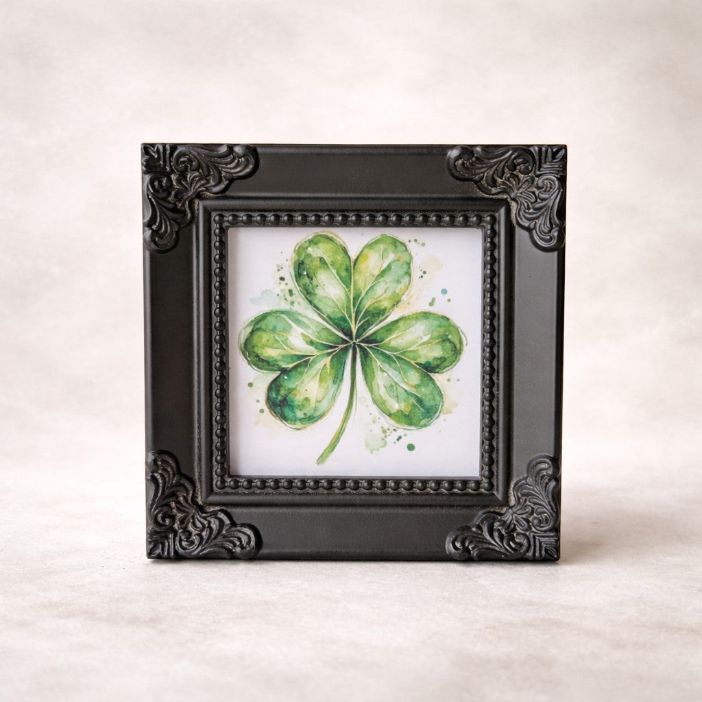 The Cottage Clover 4x4 framed watercolor shamrock art in ornate chalk black resin frame with decorative beaded border and vintage corners