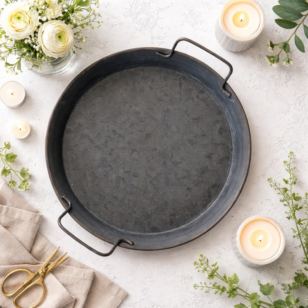 Beckett 12 inch round metal serving tray with distressed vintage finish and decorative rim, rustic farmhouse style